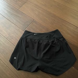 Black lululemon high rise nulux waist shorts (size 4, 4 in inseam)